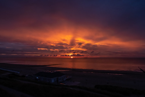 AAAK1224339,Sunset on the Zeelandic Flanders coast. Cadzand-Bad,