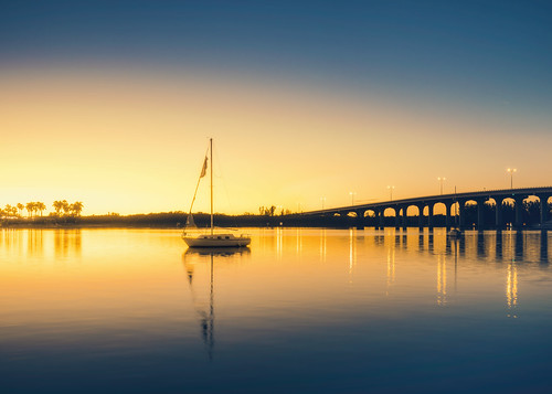 Lone Sailboat in the sunset