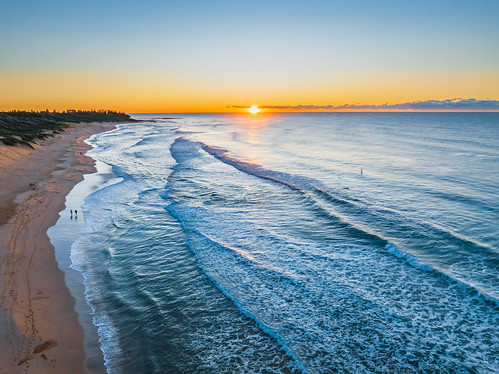 Aerial sunrise seascape with clear skies