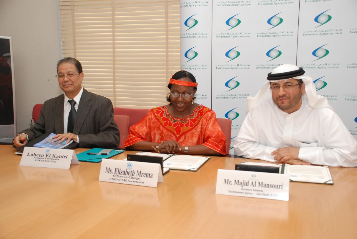 H.E. Majid Al Mansouri, Elizabeth Mrema and Lahcen El Kabiri (from right to left) during the signing ceremony on 12 October 2019 @ CMS